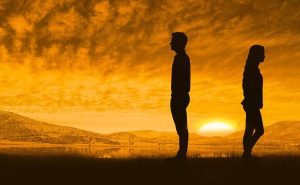 one person walking away from another setting boundaries
